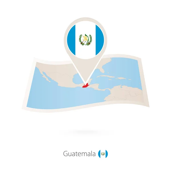 Mapa de papel dobrado de Guatemala com pino de bandeira de Guatemala . — Vetor de Stock