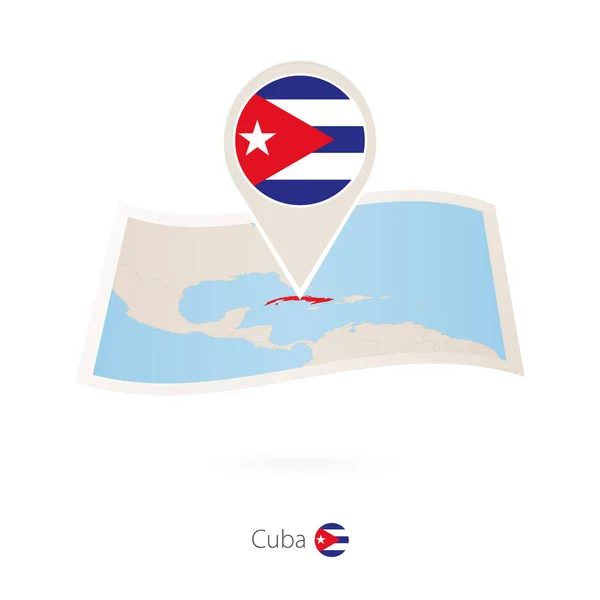 Gevouwen papieren kaart van Cuba met vlag pin van Cuba. — Stockvector