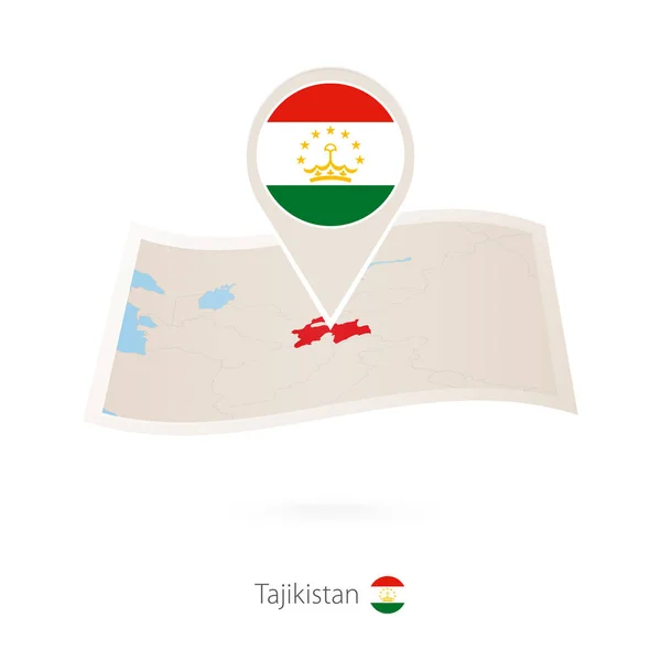 Skládané papírové mapy Tádžikistánu s pin Vlajka Tádžikistánu. — Stockový vektor