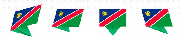 Flagge von Namibia im modernen abstrakten Design, Fahnenset. — Stockvektor