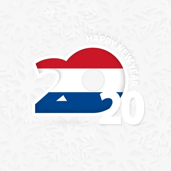 Gott nytt år 2020 för Nederländerna på snöflinga bakgrund. — Stock vektor