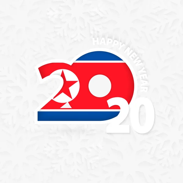 Gott nytt år 2020 för Nordkorea på snöflinga bakgrund. — Stock vektor