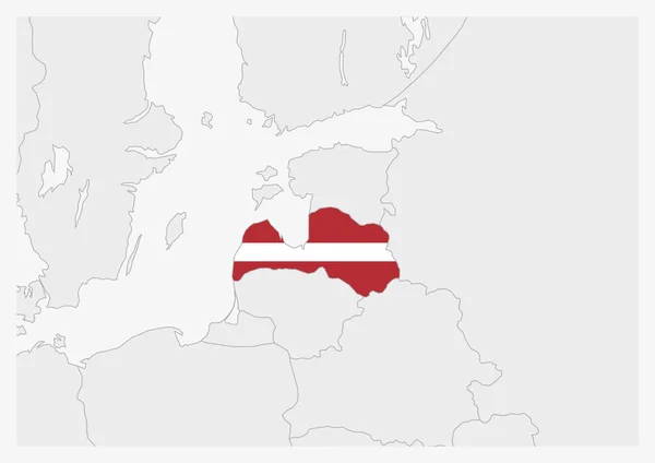 Mappa Lettonia evidenziata in Lettonia colori bandiera — Vettoriale Stock