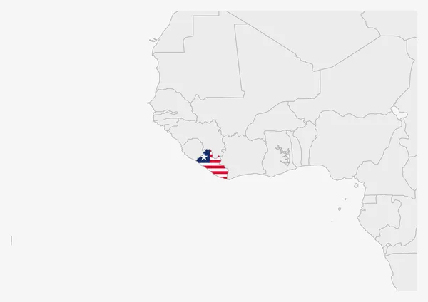 Mapa Liberii podkreślona flagami Liberii — Wektor stockowy