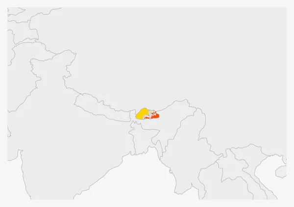 Mapa Bhutanu podkreślona w kolorach flagi Bhutanu — Wektor stockowy