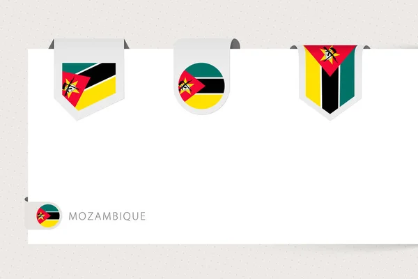 Etichetta bandiera collezione del Mozambico in forma diversa. Modello di bandiera a nastro del Mozambico — Vettoriale Stock