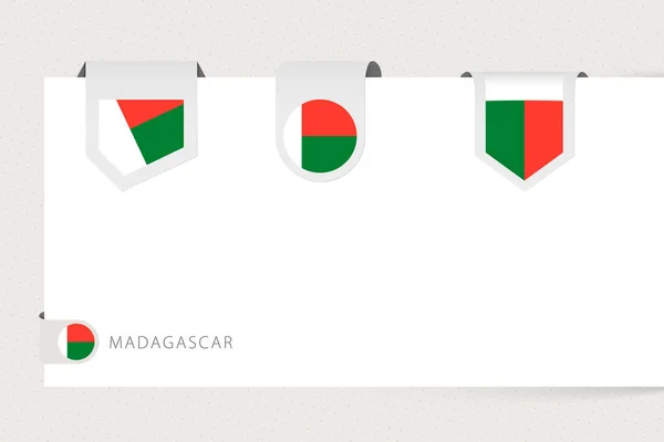 Etichetta bandiera raccolta del Madagascar in forma diversa. Modello di bandiera a nastro del Madagascar — Vettoriale Stock
