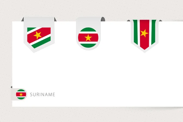 Etichetta bandiera collezione di Suriname in forma diversa. Modello bandiera nastro — Vettoriale Stock