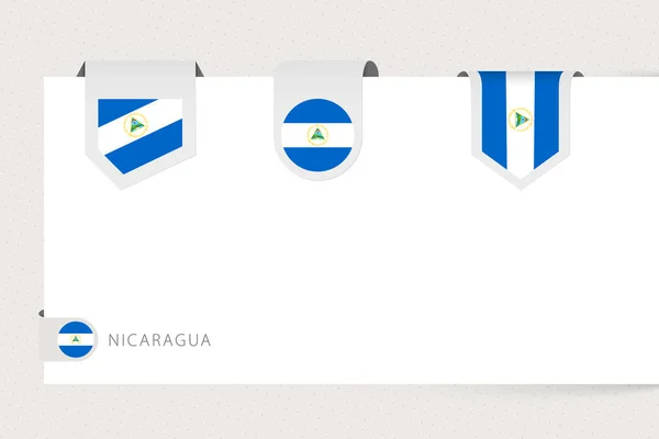 Etiqueta bandera colección de Nicaragua en diferentes formas. Plantilla bandera de cinta — Archivo Imágenes Vectoriales