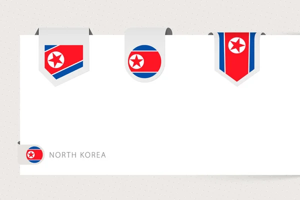 Kolekcja flag etykiet Korei Północnej w różnym kształcie. Wzór bandery wstążki — Wektor stockowy