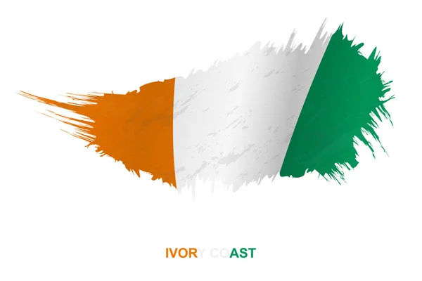 Flagga Elfenbenskusten Grunge Stil Med Viftande Effekt Vektor Grunge Pensel — Stock vektor