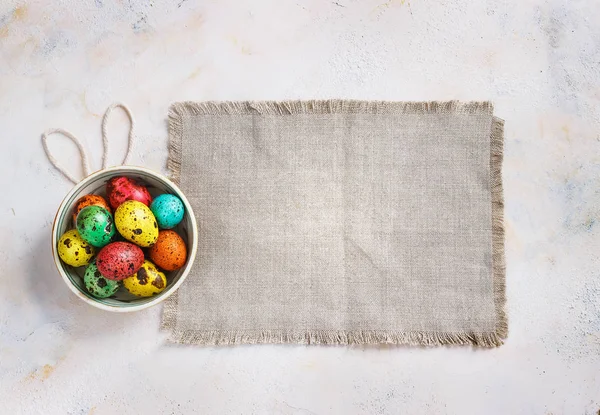 Colored easter eggs on a light canvas background,place for text — Stock Photo, Image