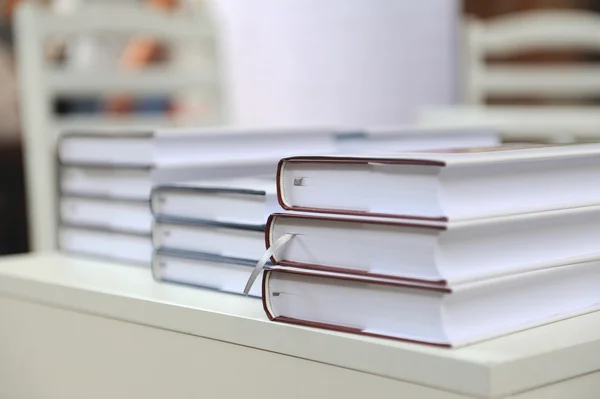 A stack of books on a  table — Stock Photo, Image