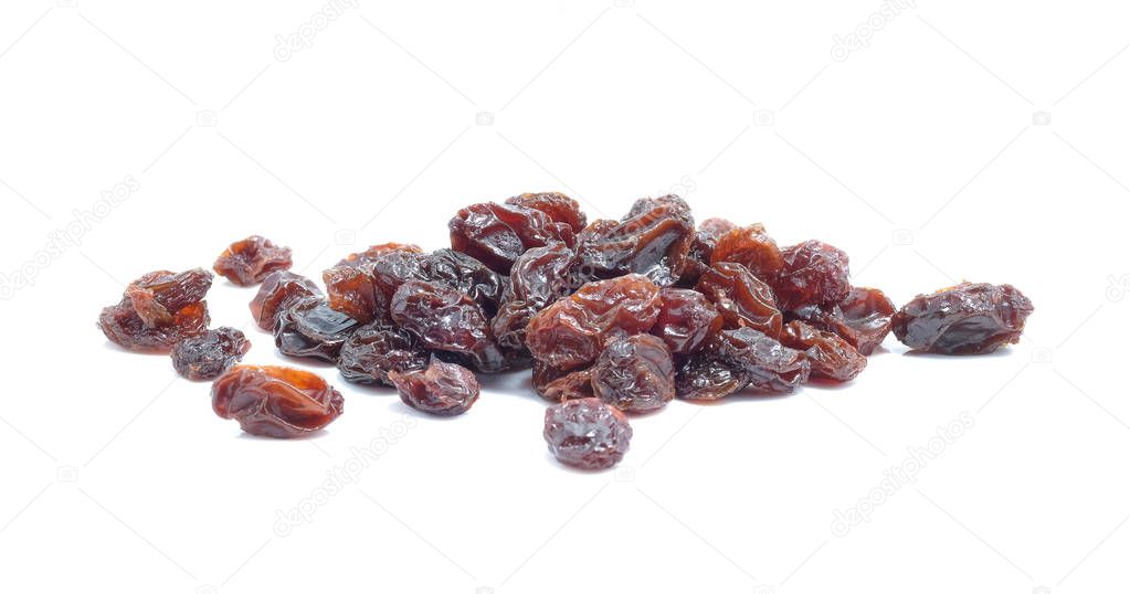 Dried grapes on white background.