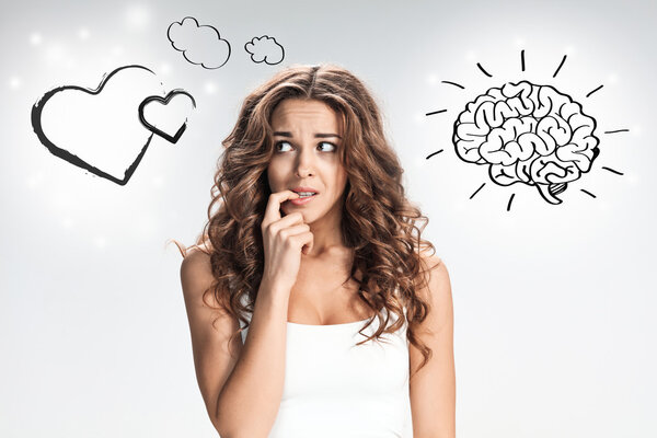 The young womans portrait with frightened emotions