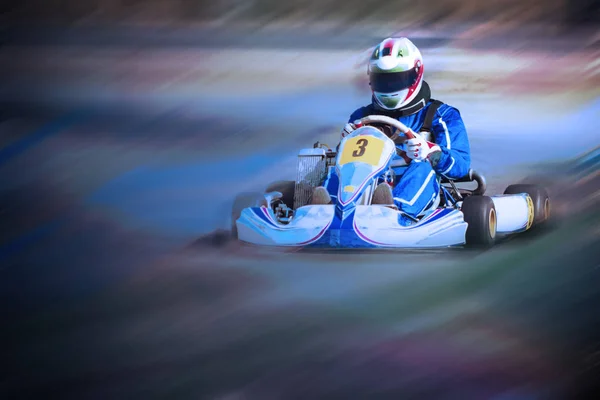 Karting - driver in helmet on kart circuit — Stock Photo, Image