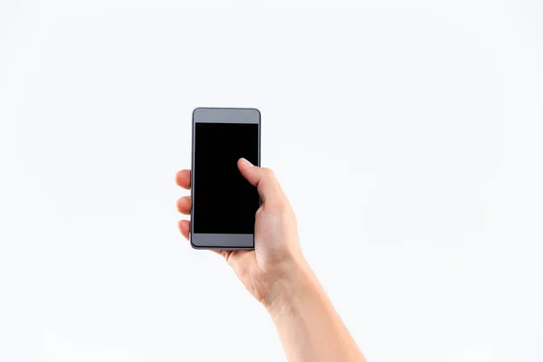 Рука людини тримає порожній великий мобільний смартфон — стокове фото