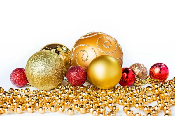 Gold Christmas balls on white — Stock Photo, Image