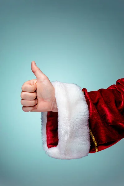 Santa claus hand tonen duimen omhoog — Stockfoto