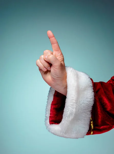 Zdjęcie ręki Santa Claus w wskazując gest — Zdjęcie stockowe