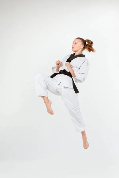 The karate girl with black belt — Stock Photo, Image