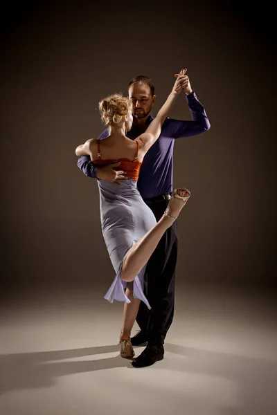 The man and the woman dancing argentinian tango