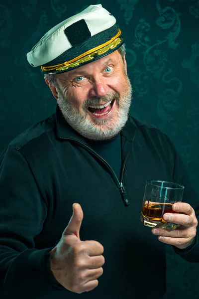 Portrait of old captain or sailor man in black sweater — Stock Photo, Image