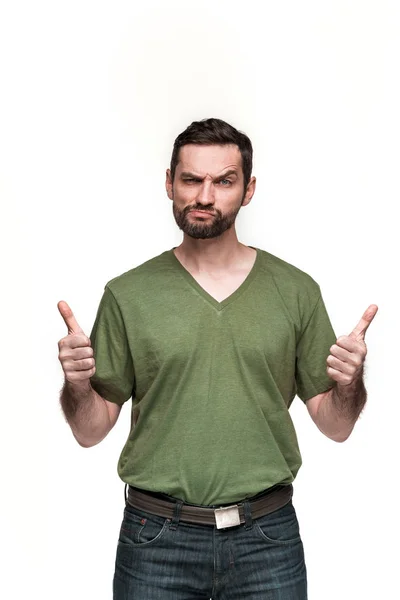 The young man looking at camera — Stock Photo, Image