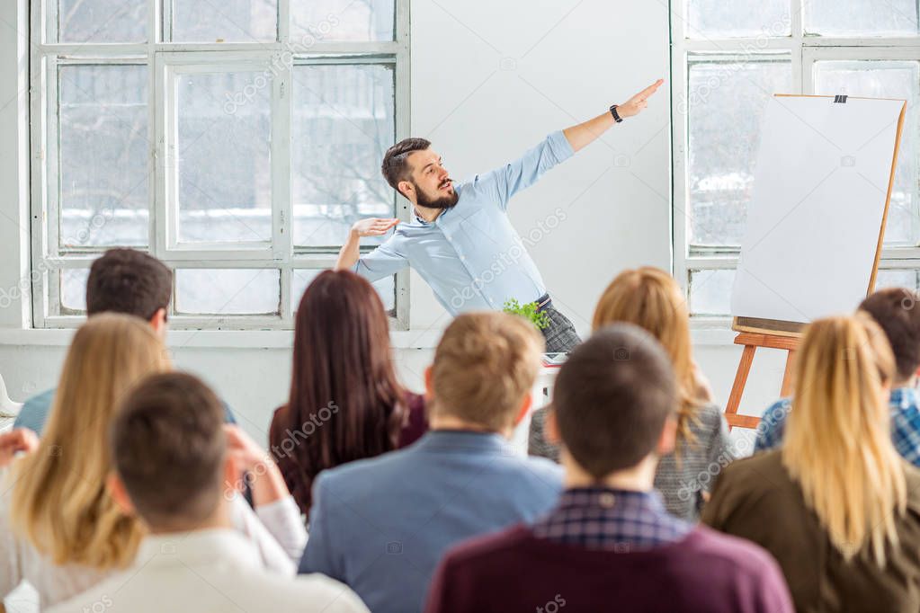 Speaker at Business Meeting in the conference hall.