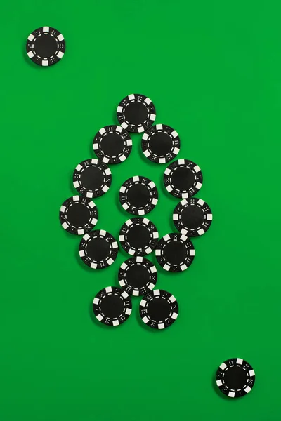 The poker chips on green background — Stock Photo, Image