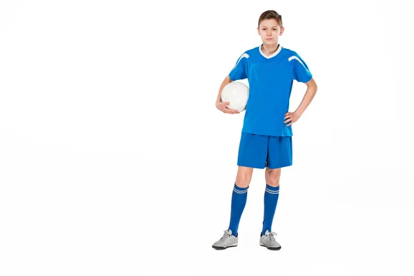Young boy with soccer ball doing flying kick — Stock Photo, Image