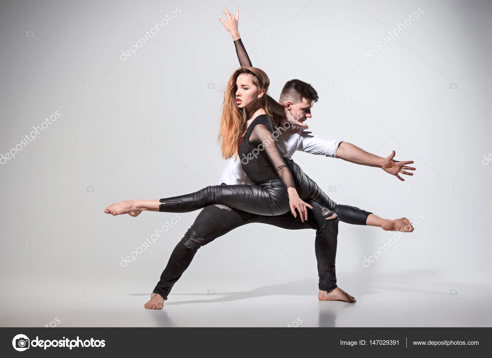 two dancing figures