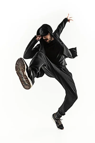 흰색 배경에서 춤을 한 힙합 남성 브레이크 댄서의 실루엣 — 스톡 사진