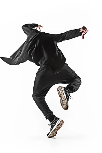 A silhueta de um hip hop dançarino break masculino dançando em fundo branco — Fotografia de Stock