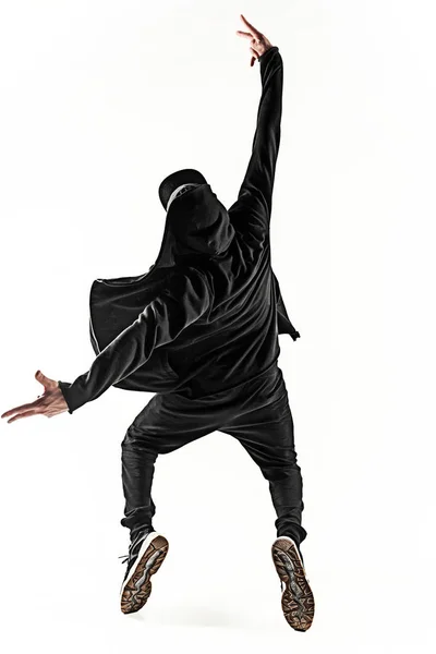 Silueta jednoho hip hopu mužské konec tanečnice tančí na bílém pozadí — Stock fotografie