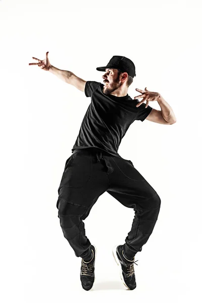 The silhouette of one hip hop male break dancer dancing on white background Stock Picture