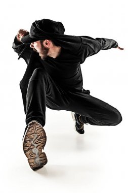 Beyaz arka plan üzerinde bir hip hop erkek break dansçı silüeti