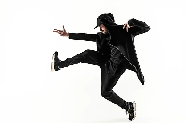 Het silhouet van een hip hop mannelijke pauze danser dansen op witte achtergrond — Stockfoto
