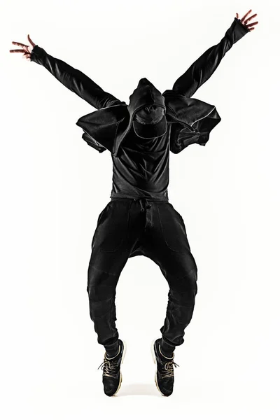 La silhouette d'un danseur de pause masculin hip hop dansant sur fond blanc — Photo