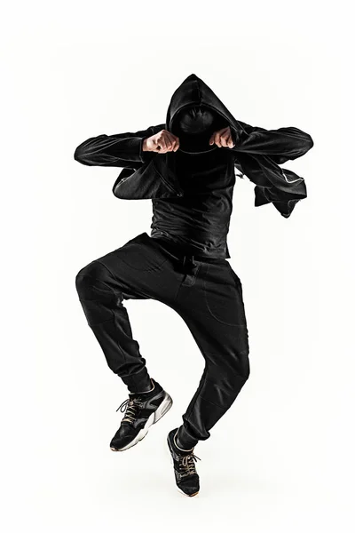 Het silhouet van een hip hop mannelijke pauze danser dansen op witte achtergrond — Stockfoto