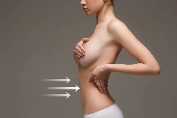 Women belly with the drawing arrows — Stock Photo, Image