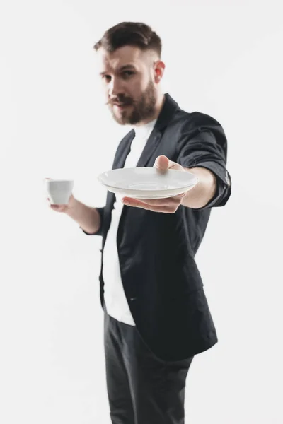 Portret van stijlvolle knappe jongeman met kopje koffie — Stockfoto