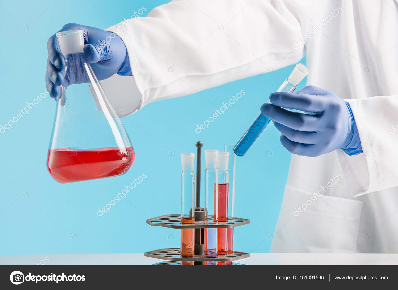 Experiments in a chemistry lab. conducting an experiment in the