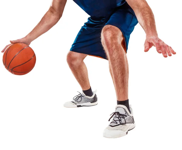 Die Beine eines Basketballspielers mit Ball — Stockfoto