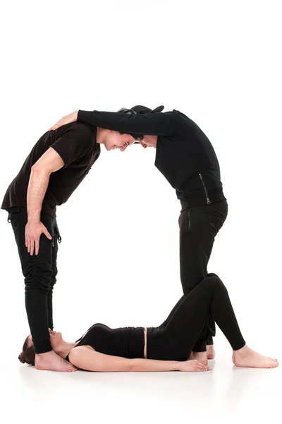 La lettre Q formée par les corps de gymnaste — Photo