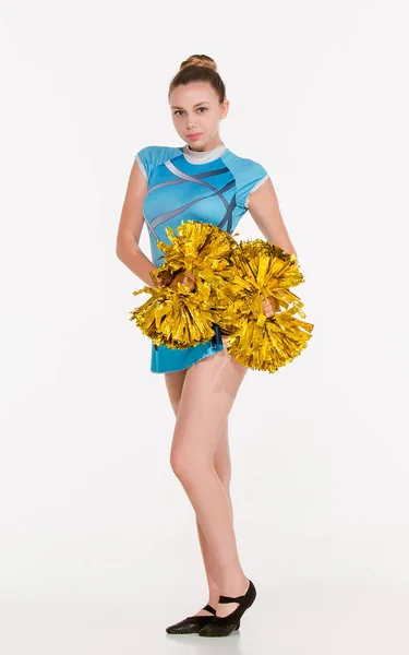 Der jugendliche Cheerleader posiert im weißen Studio — Stockfoto