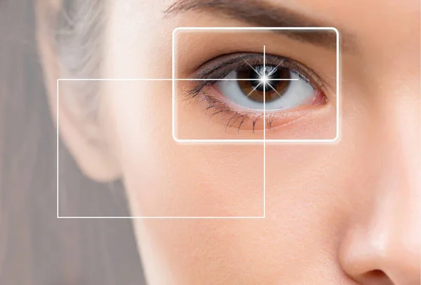 Close-up portrait of young and beautiful woman with the virtual hologram on her eyes — Stock Photo, Image