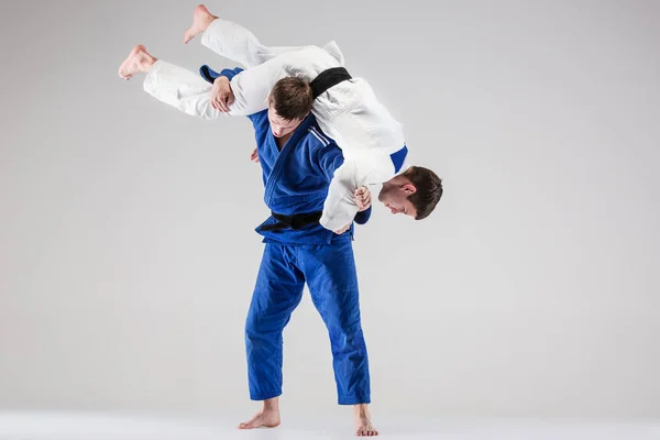 The two judokas fighters fighting men — Stock Photo, Image
