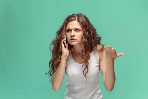 The portrait of disgusted woman with mobile phone — Stock Photo, Image