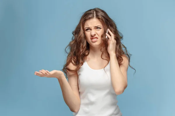 The portrait of disgusted woman with mobile phone — Stock Photo, Image